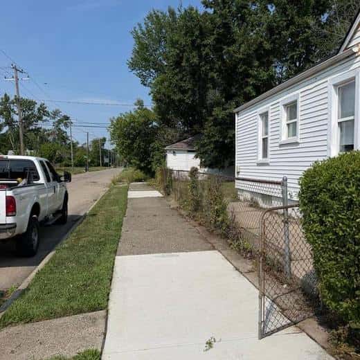 Woolfman Lawn Services on the job in metro Detroit